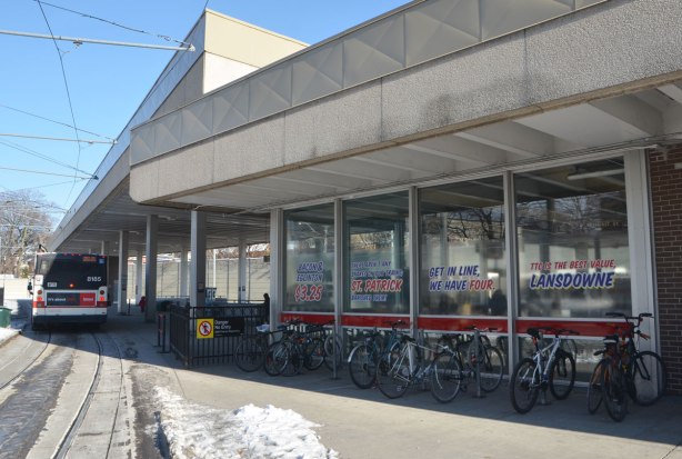 sign maker from Honest Eds store has redone some of the signs in Bathurst subway station plus, he has added some Honest Ed type promo signs around the station - on the window of the station, exterior of station by streetcar and bus loop has four signs in the windows that are puns based on the names of TTC stations. 
