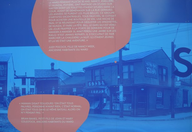 part of larger mural, reprints in blue tones of historical photos from city archives of ould buildings from the part of the city called The Ward that was demolished in the 1950's to make way for new City Hall