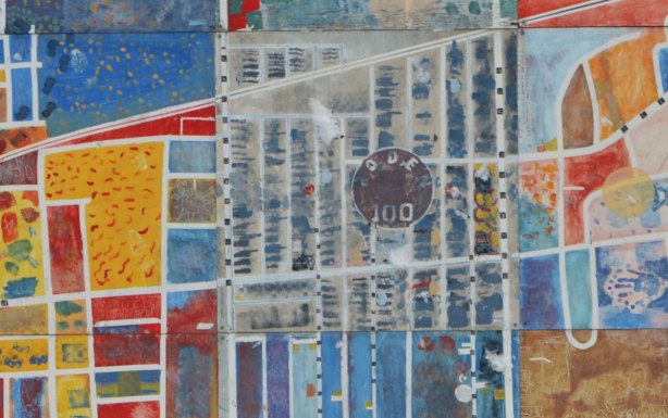 close up of the center of a mural on a conrete wall in a schoolyard that is a map of the area with the school in the center, colourful, about 8 feet high and twelve feet wide. 
