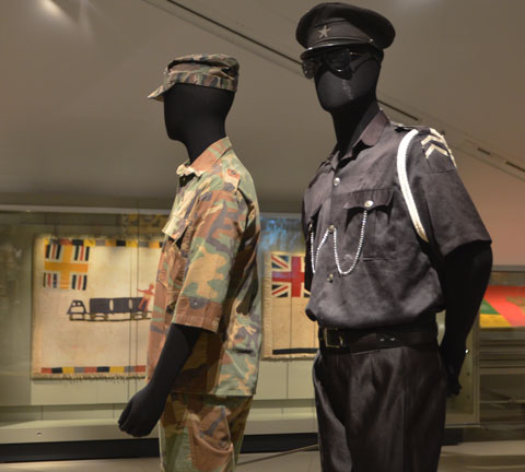 two mannequins in military uniforms as part of a museum exhibit at ROM