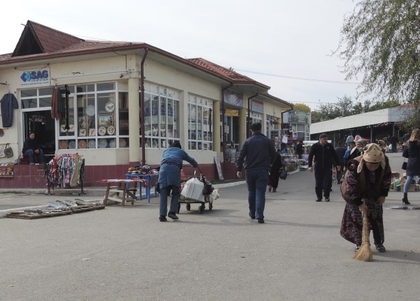 tash_market_woman_sweeping