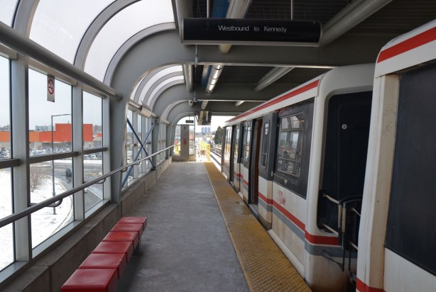 a SRT train is stopped at McCowan station, 