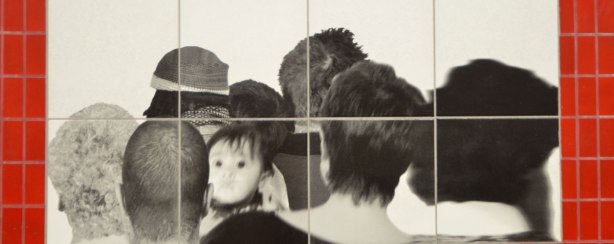 close up of black and white photo of the back of peoples heads, one child's face turns to the camera and is slightly out of focus, Passing by Sylvie Belanger at Bessarion subway station 