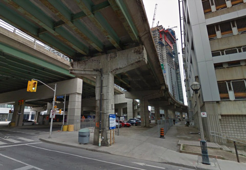 screenshot of google maps street view of Lower Simoce stret just south of the Lakeshore, one of the offramps for the Gardiner, a new condo under construction