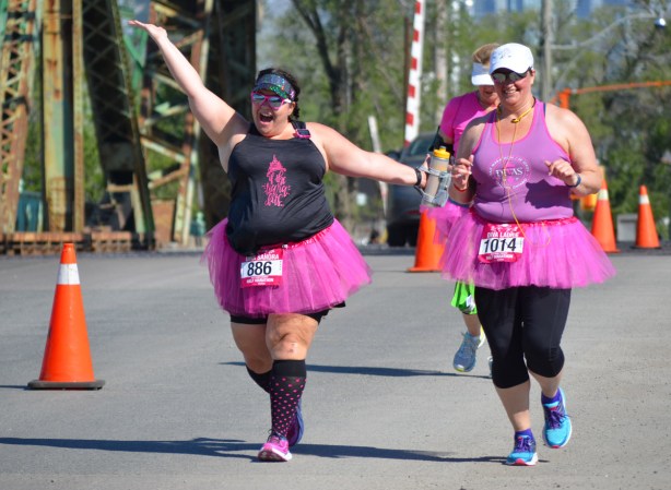 two divas in their pink tutus near the start of the RunLike a Diva event on Cherry st in the Port Lands 
