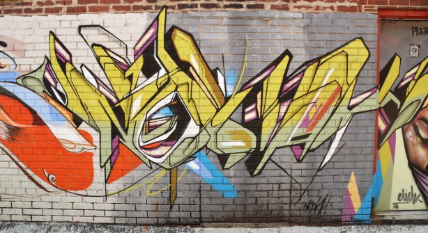 stylized throw up type graffiti 