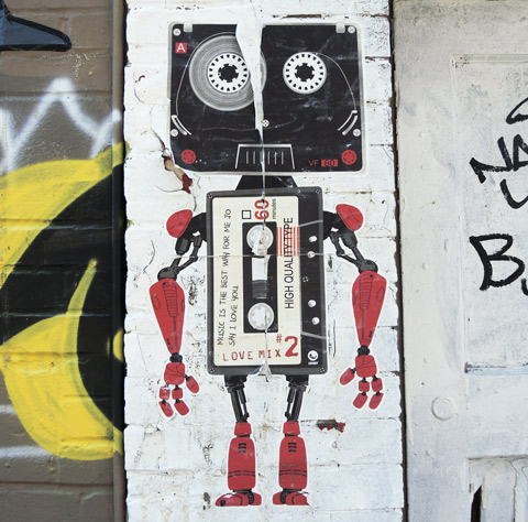 graffiti man drawn with two cassette tapes, one as head and the other as body, love mix #2, 