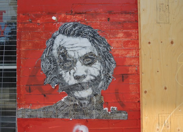 Heath Ledger as the Joker, paper paste up of the head and shoulders