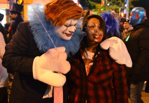 posing for photos in Halloween costumes