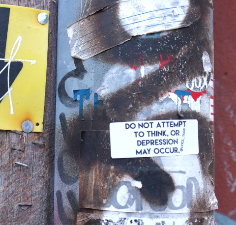 stickers graffiti in an alley