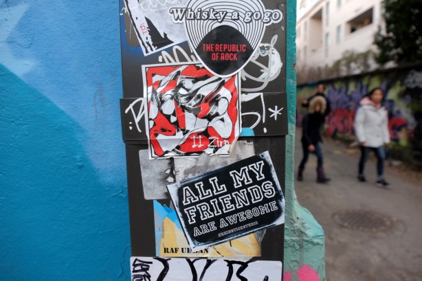 stickers graffiti in an alley