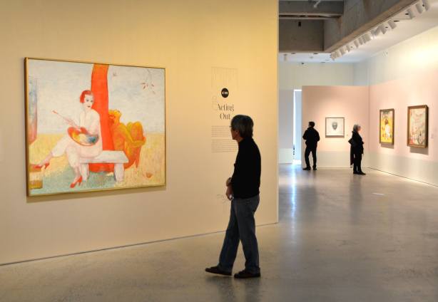 people at the Art Gallery of Ontario in a gallery featuring paintings by Florine Stettheimer, 
