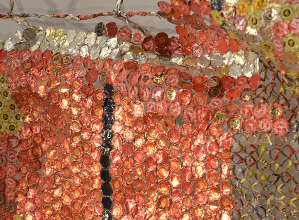 recycled liquor bottle cap artwork