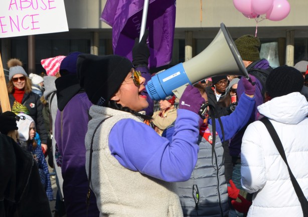 Womens March, Nathan Phillips square, a woman with a megaphone 