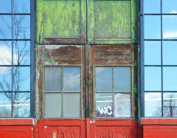 reflections of the sky in a window 