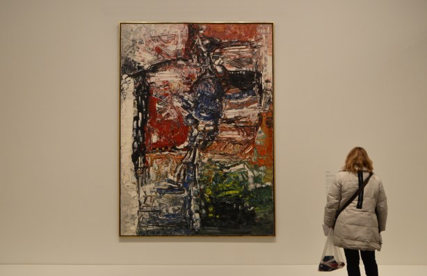 a woman with her back to the camera is looking at a large painting in an art gallery, AGO, Art gallery of Ontario, 