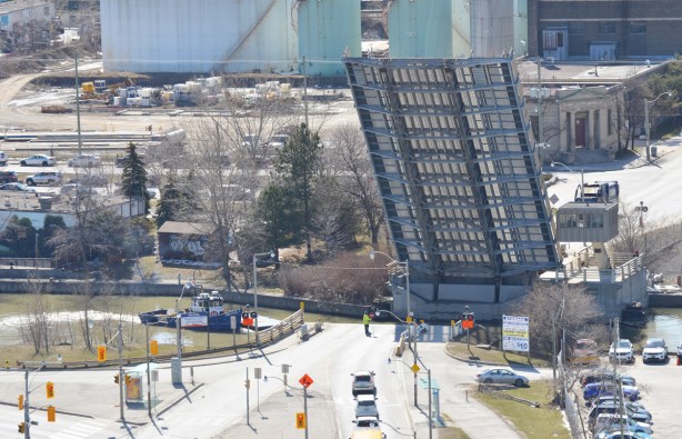lift bridge is up so a boat can pass under