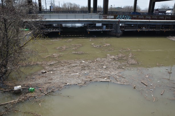 bridge over the Don River, grey, flotsam in the river, 