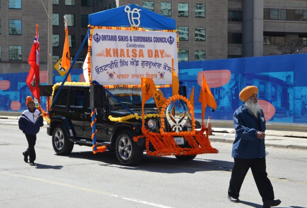 black jeep decorated as a float in khalsa day parade in toronto 