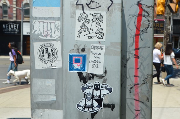 stickers on a metal box, urban ninja squadron, also one with words that say Choose people who choose you
