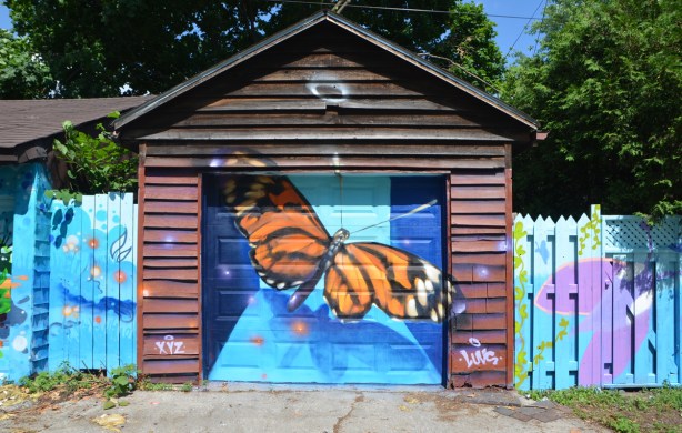 monarch butterfly painted on a garage door