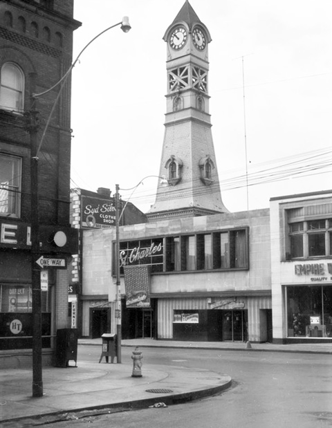black and white photo from 1955 of the St. Charles Tavern and it's clock tower on YOnge Street 