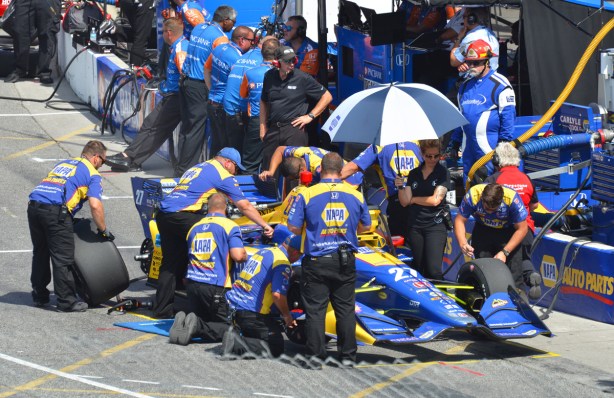 standing around a race car pre-race 
