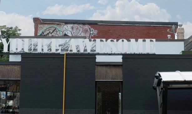 large white letter across a roof line that say you're awesome