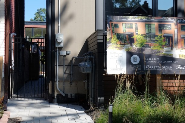 part of a modernized and renovated house with new houses built behind it