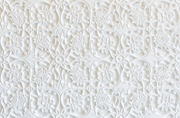 carved white wall, plaster