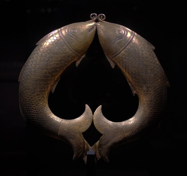 on display at the Aga Khan Museum, two fish joined in a circle, a standard, for the top of a pole 