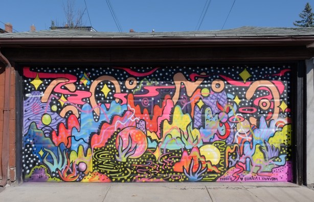 a wild mural with bright colours, shapes from nature, watery, and a black background by Ted and Diana 