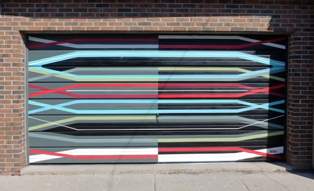 mural by nixo on garage door, straight horizontal lines
