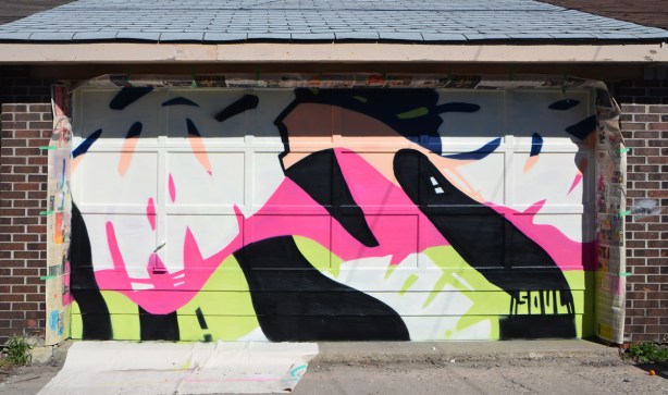 partially completed mural by artist soul, 