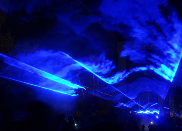 blue lights under the Gardiner at the Bentway, in front of Fort York, a light show called Waterlicht by Dutch artist Daan Roosegaarde