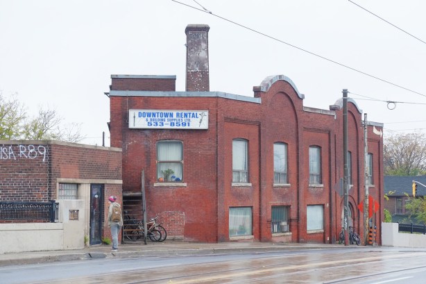 old red brick building on Dundas West, sign that says Downtown Rental