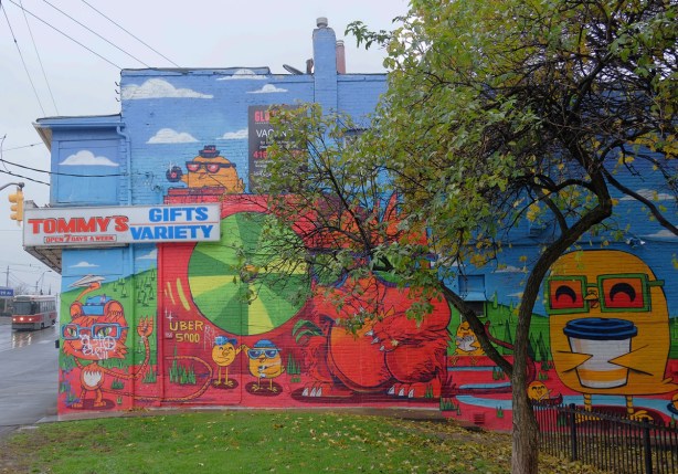 Uber5000 mural on the side of Tommys 