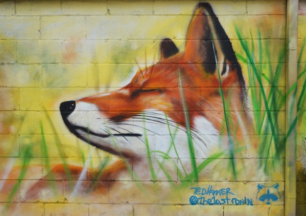 street art painting of a fox head in profile by Ed Hamer, realistic