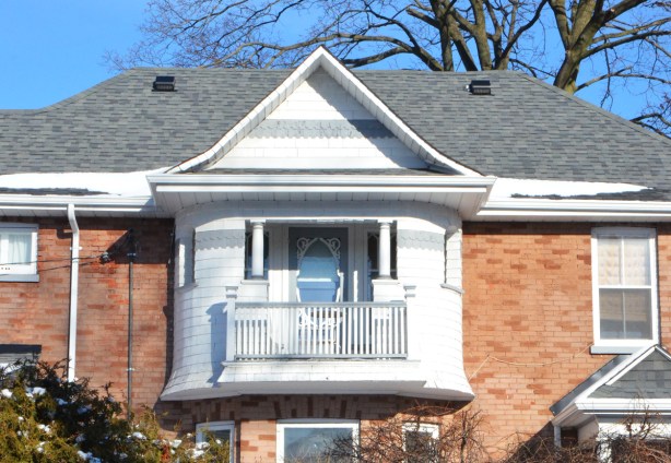 an upper storey oriel window with curved edges
