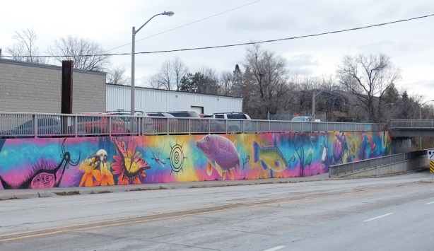 a large section of the mural by Nick Sweetman on 30th street as it passes under the railway tracks 