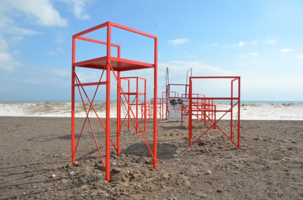 red metal chairs that look like lifeguard stations, part of Winter Stations 2019 at Woodbine Beach, 