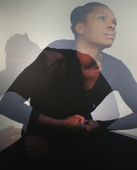 part of a photo by Stella Fakiyesi of a black woman, two images superimposed on one another