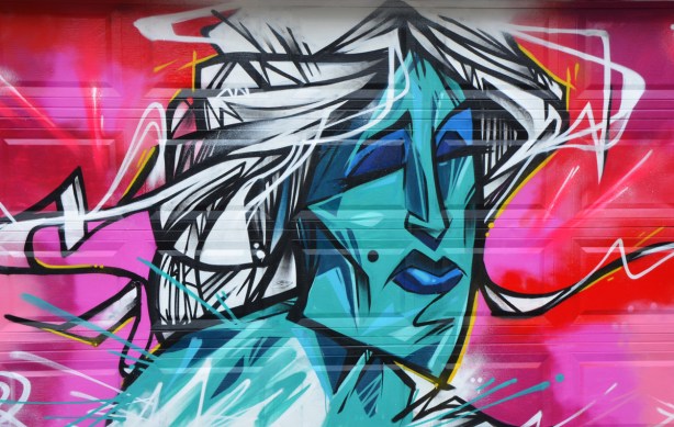 stylized painting of a womans head, blue skin, white hair, pink background