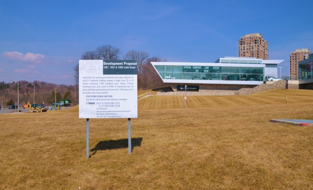 development proposal sign on the lawn of what used to be the Inn on the Park on the north east corner of Leslie and Eglinton 