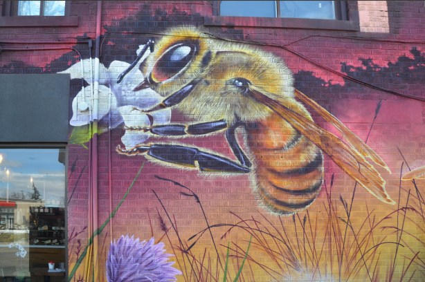 part of a nick sweetman pollinators mural, a bee