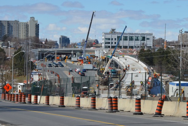 work on the west end of the corsstown lrt, after the tracks emerge from underground, raised track for a section before final station 