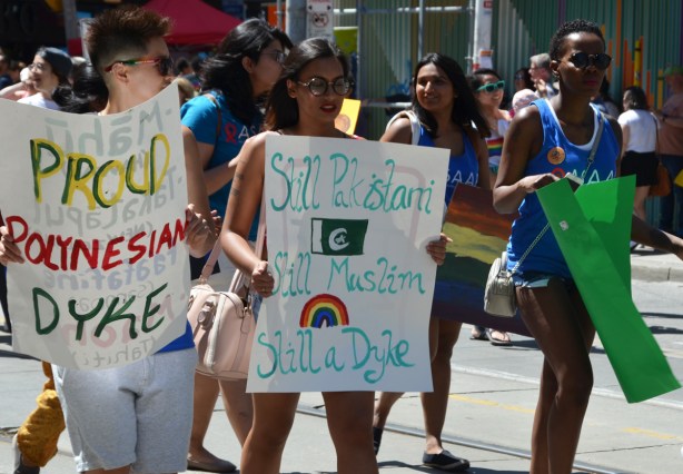 women in dyke march, including a polynesian and a muslim