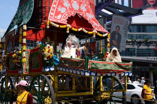 elaborately decorated festival of india float in a parade 