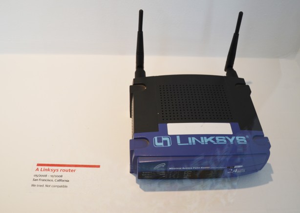 an old Linksys router on display in a museum show 