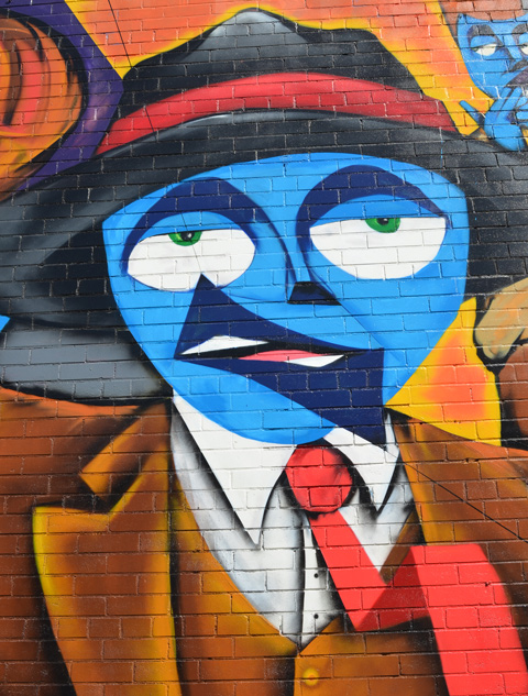 part of a mural, the band of story tellers, a group of musicians all with blue skin, 